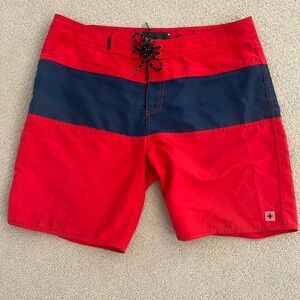 Tavik Red and Blue Board Shorts with Color-Blocked Design